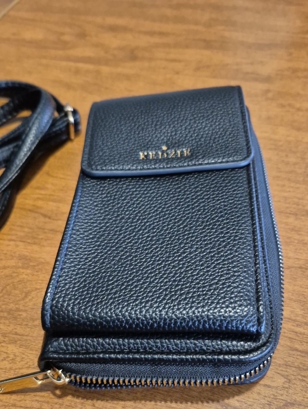 kenzie Black Pebbled Leather Crossbody Phone Wallet with Gold Logo